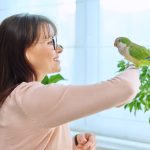 woman with pet bird