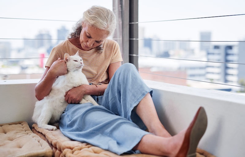 woman with white cat